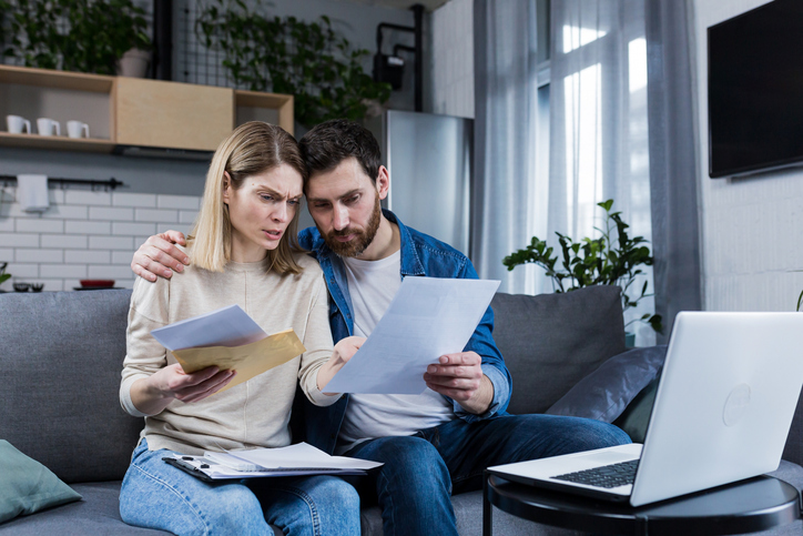 Homeowners review how much the mansion tax will cost.